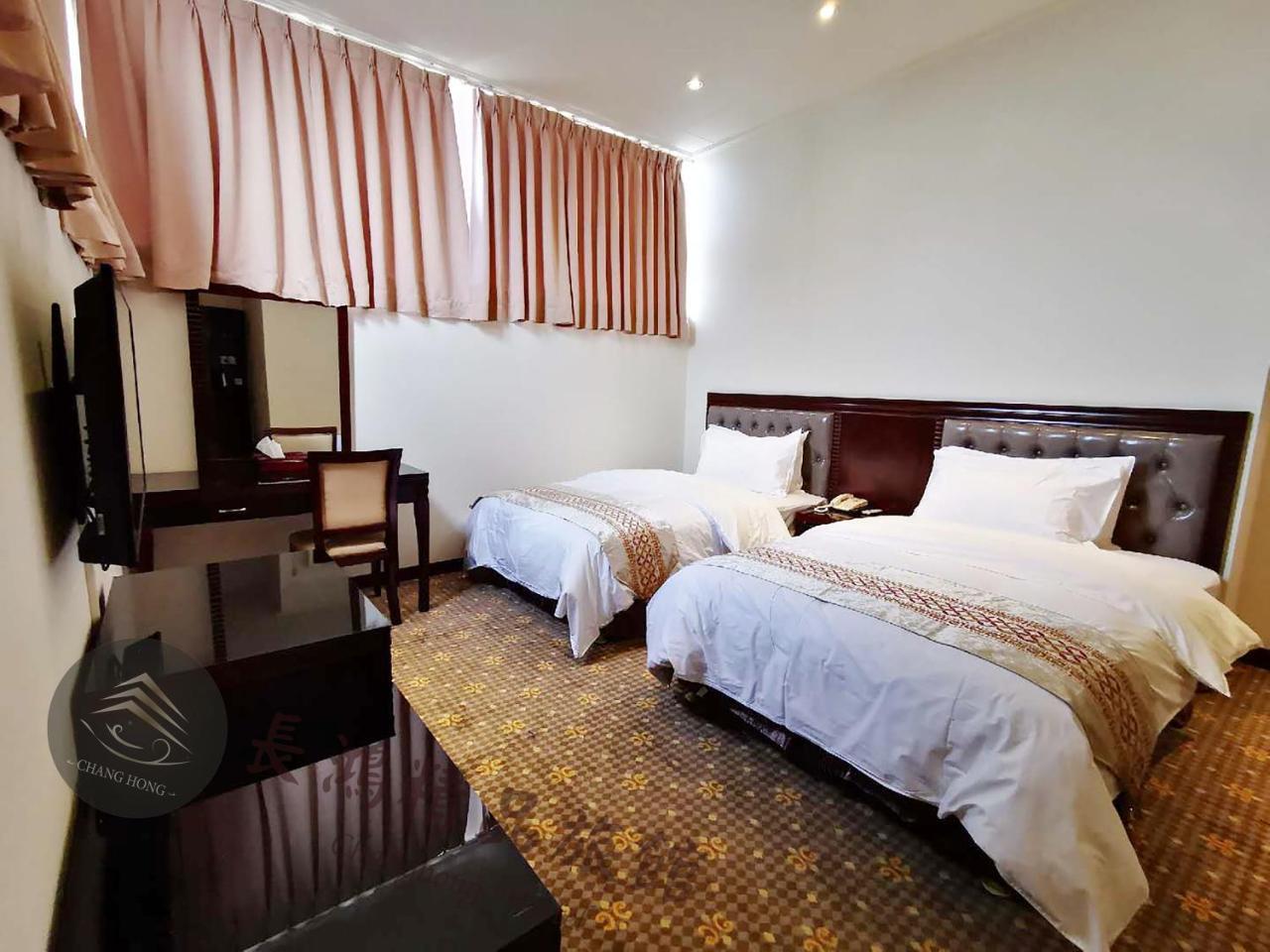 Chang Hong Hotel Jinning Buitenkant foto
