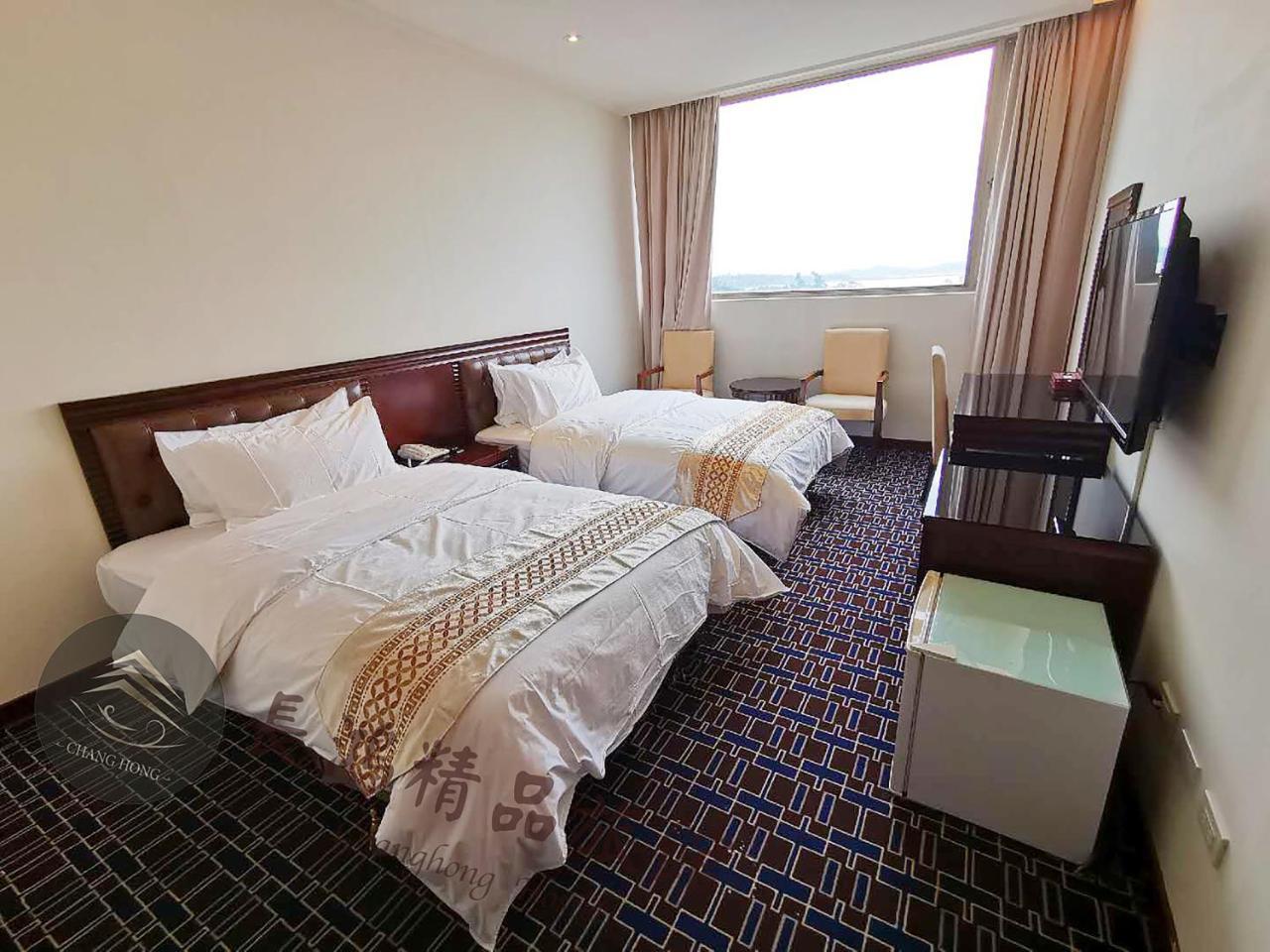 Chang Hong Hotel Jinning Buitenkant foto